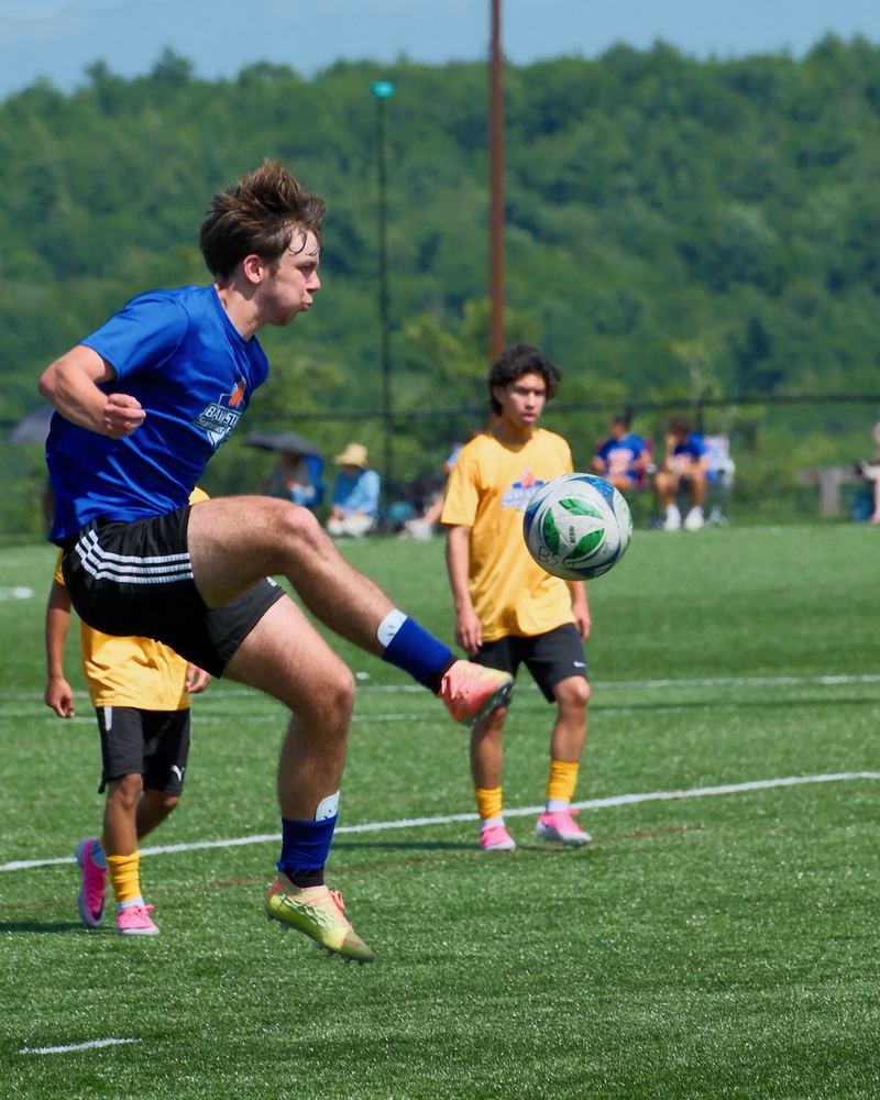 Ryan controlling the ball out of the air in a match